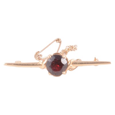 Lot 184 - A garnet bar brooch.