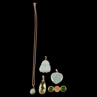 Lot 332 - Three jadeite pendants, oro verde quartz pendant, gold chain, and jadeite brooch.