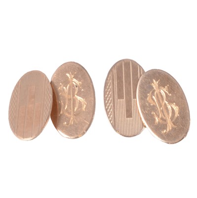 Lot 354 - A pair of 9 carat yellow gold cufflinks.