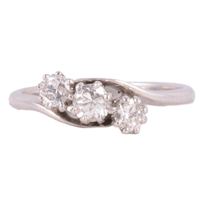 Lot 83 - A diamond three stone ring.