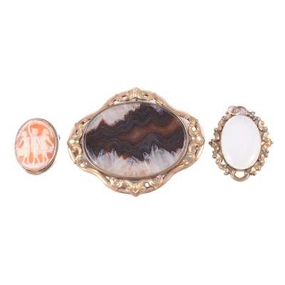 Lot 205 - A large agate brooch, chalcedony pendant and cameo brooch.