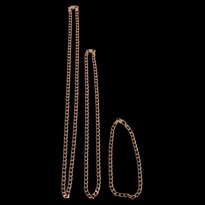 Lot 318 - Uno A Erre - two yellow metal chain necklaces, and a matching bracelet.