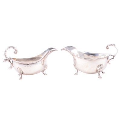Lot 254 - Silver sauce boat, Harrison Brothers & Howson, Sheffield 1963, and another.