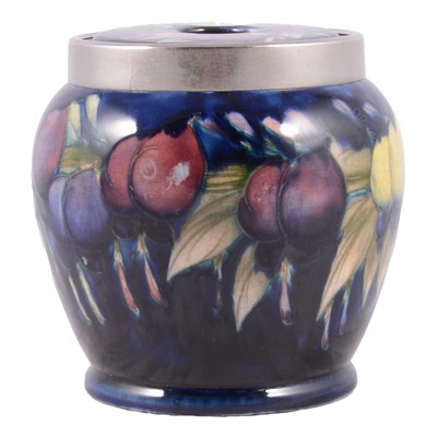 Lot 49 - Moorcroft Pottery, a 'Wisteria' pattern jar and cover / string box, 1920s