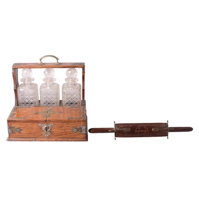 Lot 100 - Edwardian oak tantalus, cutlery tray, etc.