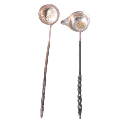 Lot 301 - Two toddy ladles with whalebone handles.
