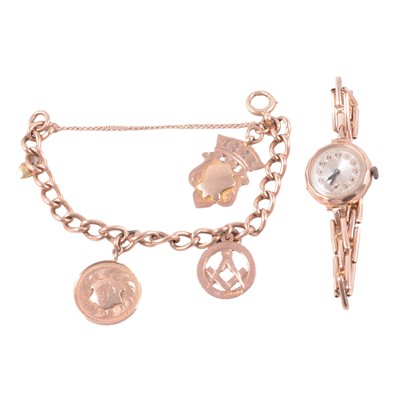 Lot 223 - A rose metal curb link bracelet with fobs / medallions, and a lady's 9 carat yellow gold wristwatch.