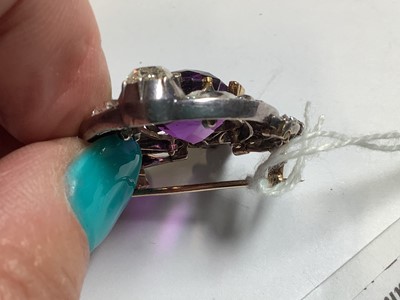Lot 174 - A Victorian amethyst and diamond brooch.