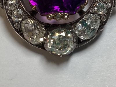 Lot 174 - A Victorian amethyst and diamond brooch.