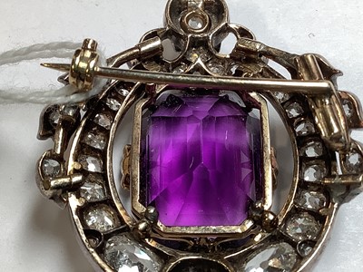 Lot 174 - A Victorian amethyst and diamond brooch.