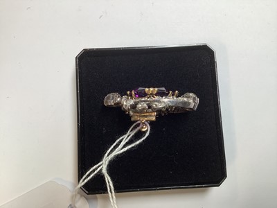 Lot 174 - A Victorian amethyst and diamond brooch.