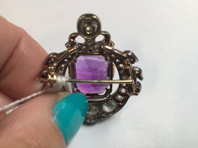 Lot 174 - A Victorian amethyst and diamond brooch.