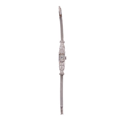 Lot 446 - A lady's diamond set cocktail watch.