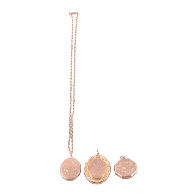 Lot 295 - Three 9 carat gold "back and front" lockets, and a yellow metal fancy link chain.