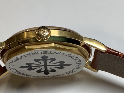Lot 418 - Patek Philippe - a gentleman's 18 carat yellow gold wristwatch.