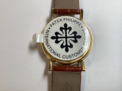 Lot 418 - Patek Philippe - a gentleman's 18 carat yellow gold wristwatch.