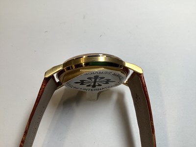Lot 418 - Patek Philippe - a gentleman's 18 carat yellow gold wristwatch.