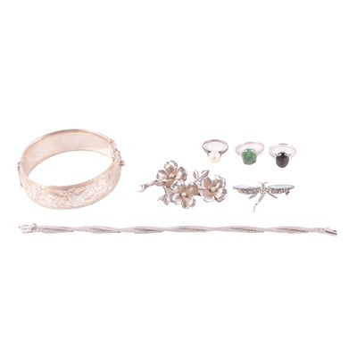 Lot 466 - A silver half-hinged bangle, white metal bracelet, rings, and brooches.