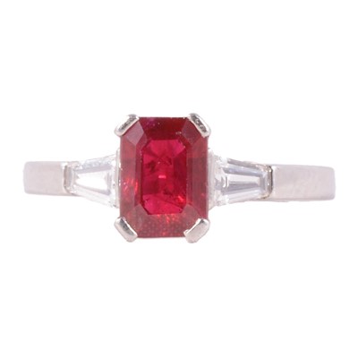 Lot 9 - A ruby and diamond three stone ring.