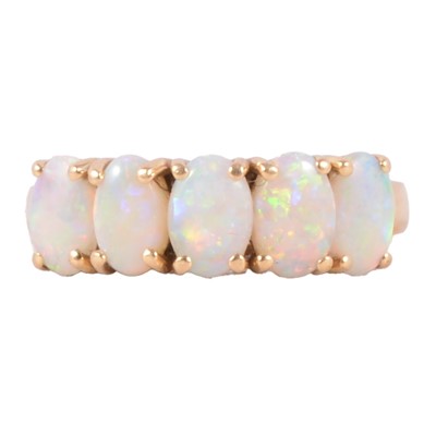 Lot 35 - An opal five stone ring.