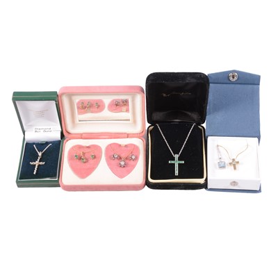 Lot 273 - Four gemset pendants on chains, and two gemset pendants on chains with matching earrings.
