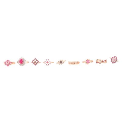Lot 59 - Seven natural and synthetic ruby rings, and two garnet rings.