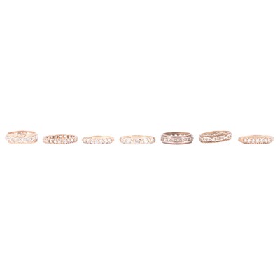 Lot 61 - Seven synthetic white stone rings.