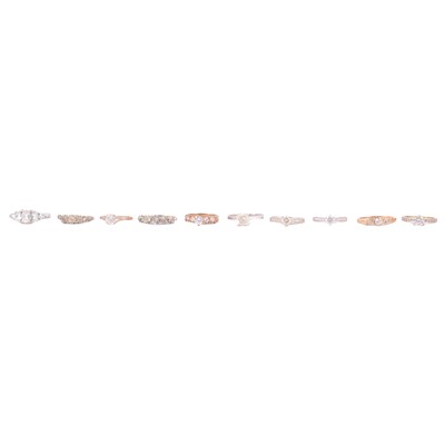 Lot 63 - Ten synthetic white stone rings.