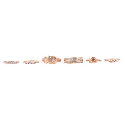 Lot 110 - Four diamond rings, and a yellow metal ring.
