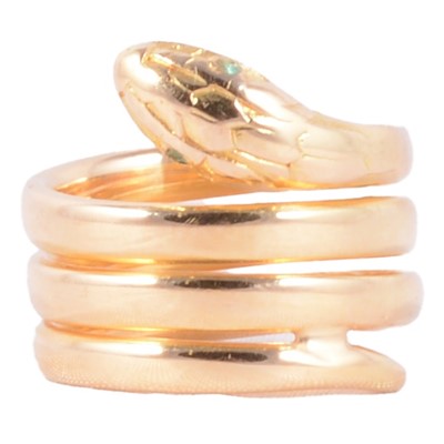 Lot 115 - A yellow metal snake ring.