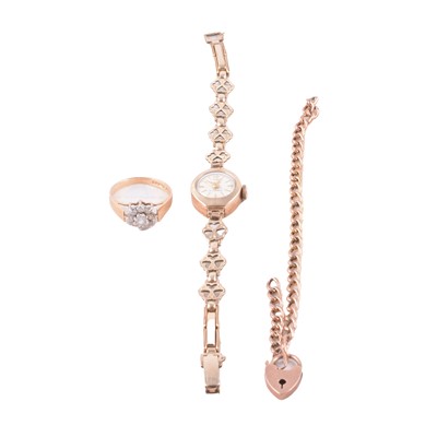 Lot 159 - A synthetic white stone cluster ring, rose metal bracelet, and lady's vintage gold wristwatch.