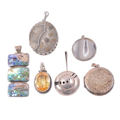 Lot 480 - A collection of silver, white metal and base metal pendants, some gemset.