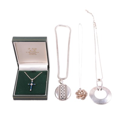 Lot 481 - A collection of silver and white metal necklaces, pendants, and chains.