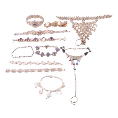 Lot 479 - A collection of silver, white metal and base metal bracelets, some gemset.