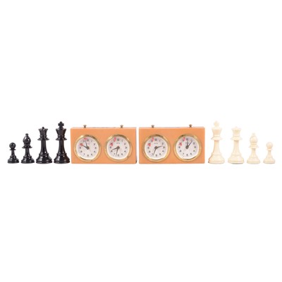Lot 92 - Chess; two plastic club sets and two clocks