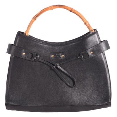Lot 506 - Gucci - a leather handbag with bamboo handle.