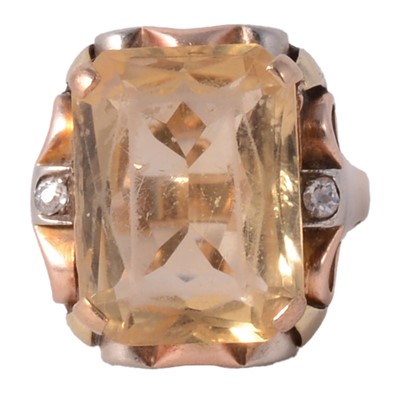 Lot 7 - A citrine and diamond ring.