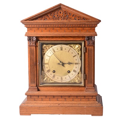 Lot 117 - Late Victorian oak mantel clock