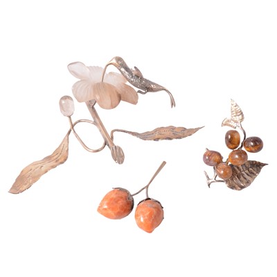 Lot 203 - Three South American white metal and hardstone ornaments