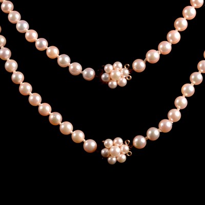 Lot 316 - Two cultured pearl necklaces that may be worn as one longer rope necklace.