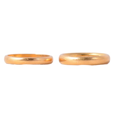Lot 133 - Two 22 carat yellow gold wedding bands.