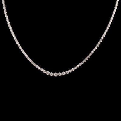 Lot 293 - A diamond riviere necklace.