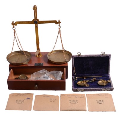 Lot 104 - A collection of watch and jewellery findings, loose gemstones, and jeweller's scales.
