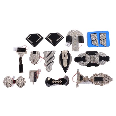 Lot 481 - Ten Art Deco paste and faux black onyx brooches and clips, possible mourning jewellery.