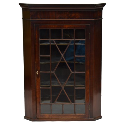 Lot 443 - George III mahogany hanging corner cabinet