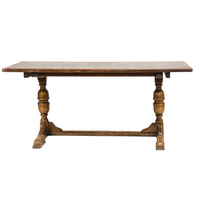 Lot 429 - Oak trestle dining table