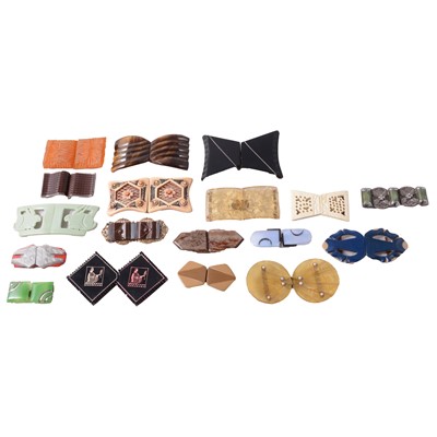 Lot 517 - Nineteen early bakelite and plastic two part buckles.