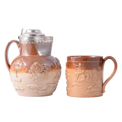 Lot 118 - Stoneware harvest jug with silver lidded mount and another tankard.