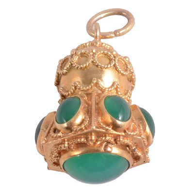 Lot 321 - An Italian Etruscan revival charm/pendant, circa 1970's, set with green chalcedony.