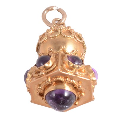 Lot 320 - An Italian Etruscan revival charm/pendant, circa 1970's, set with amethyst.